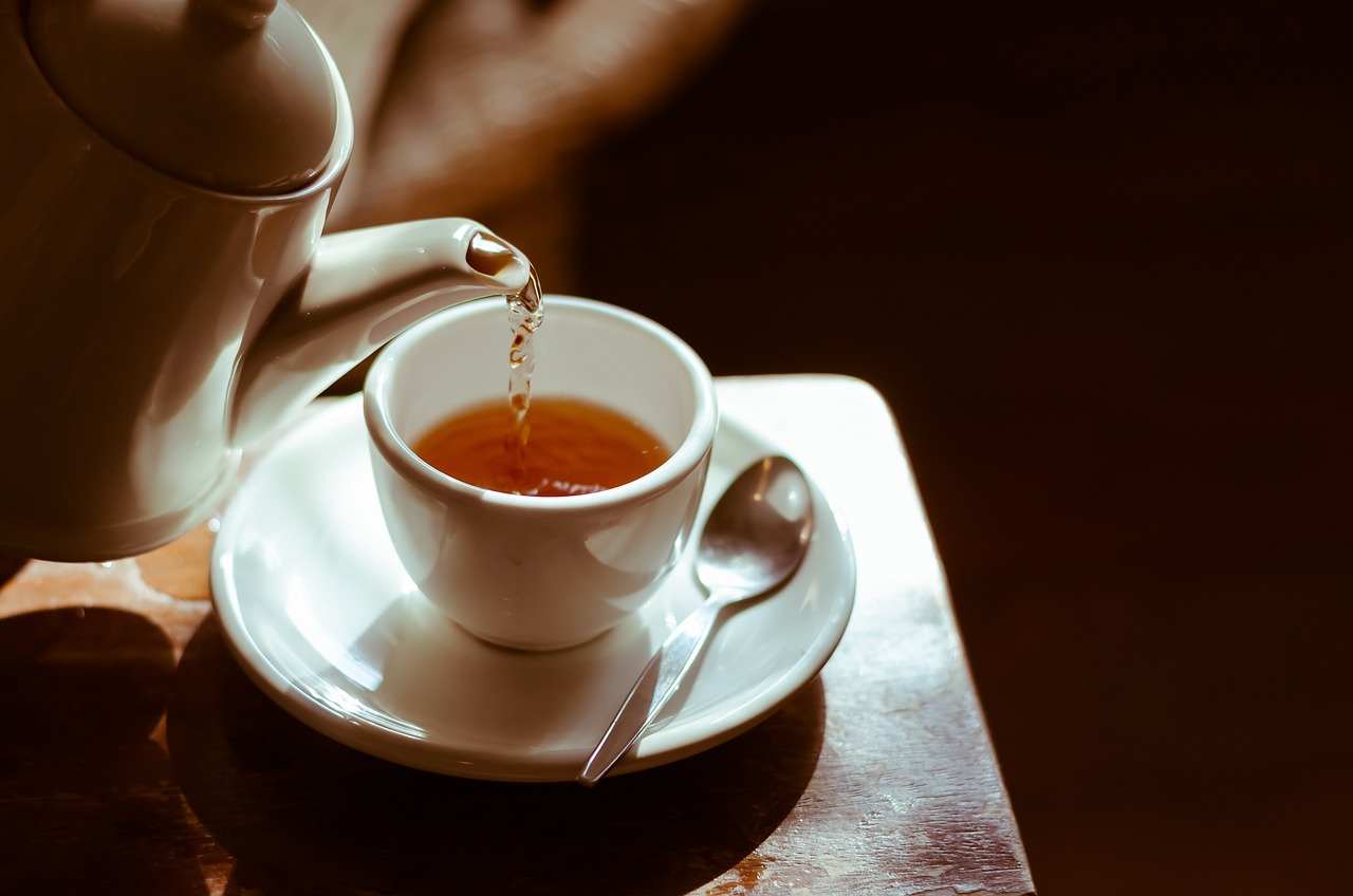 Traditional British afternoon tea with scones, jam, and tea