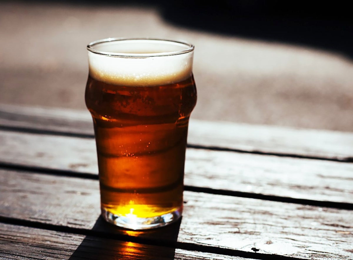 Pint of ale in a traditional pub setting